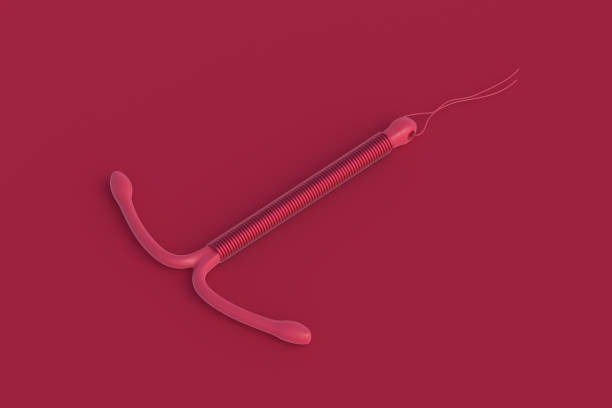 Illustration of an intrauterine device (IUD) with a red background.
